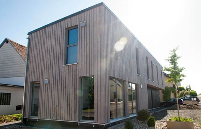 Exterior wood finish on wood paneled building.