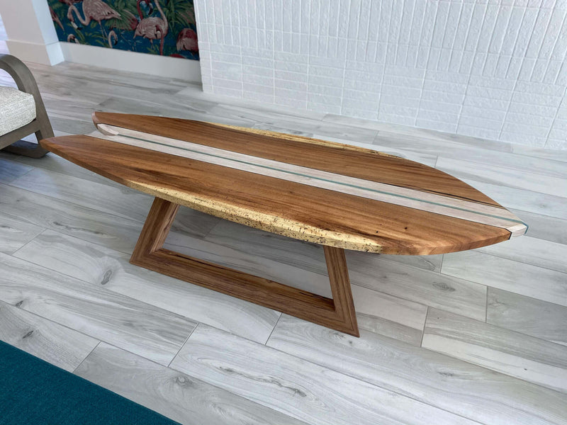 Wooden coffee table made from monkeypod and teak finished with hardwax oils.