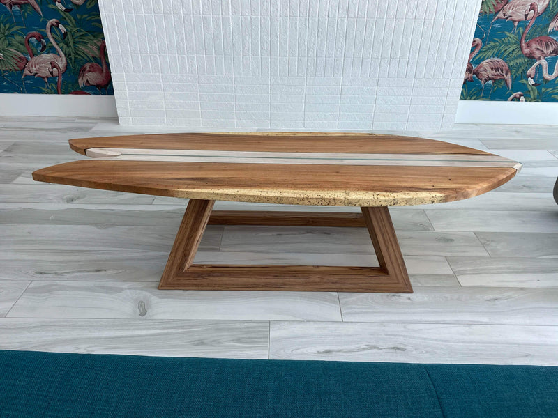 Wood surfboard coffee table finished with Oil Plus 2C and other Rubio Monocoat products.