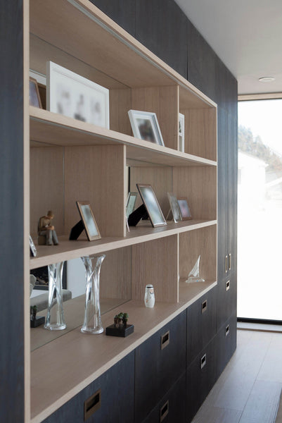 Shelves built into built cabinets.