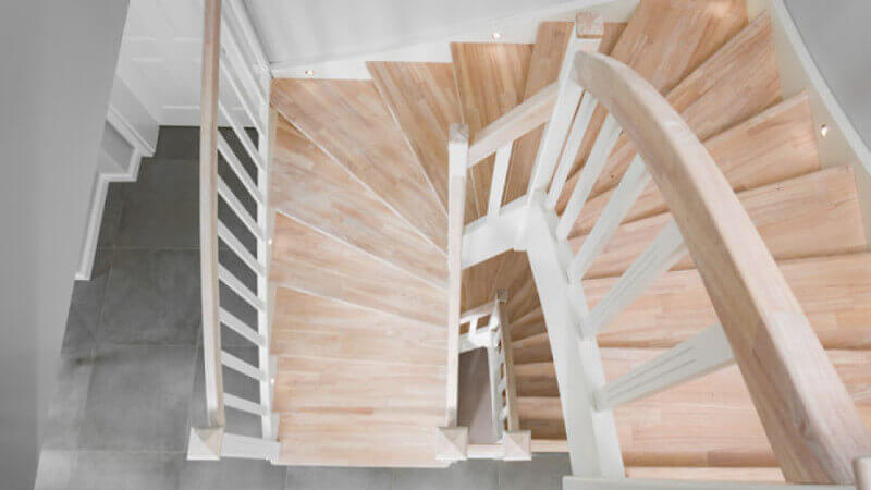 A top down view of stair treads finished using a durable, natural, plant-based hardwax oil wood finish.