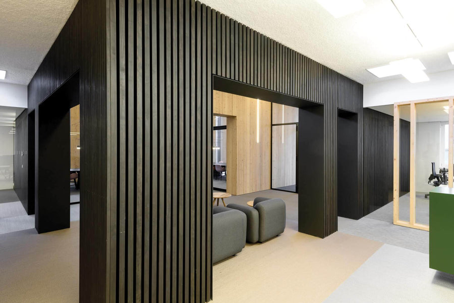 Office architecture with wood slats finished in dark wood finish.