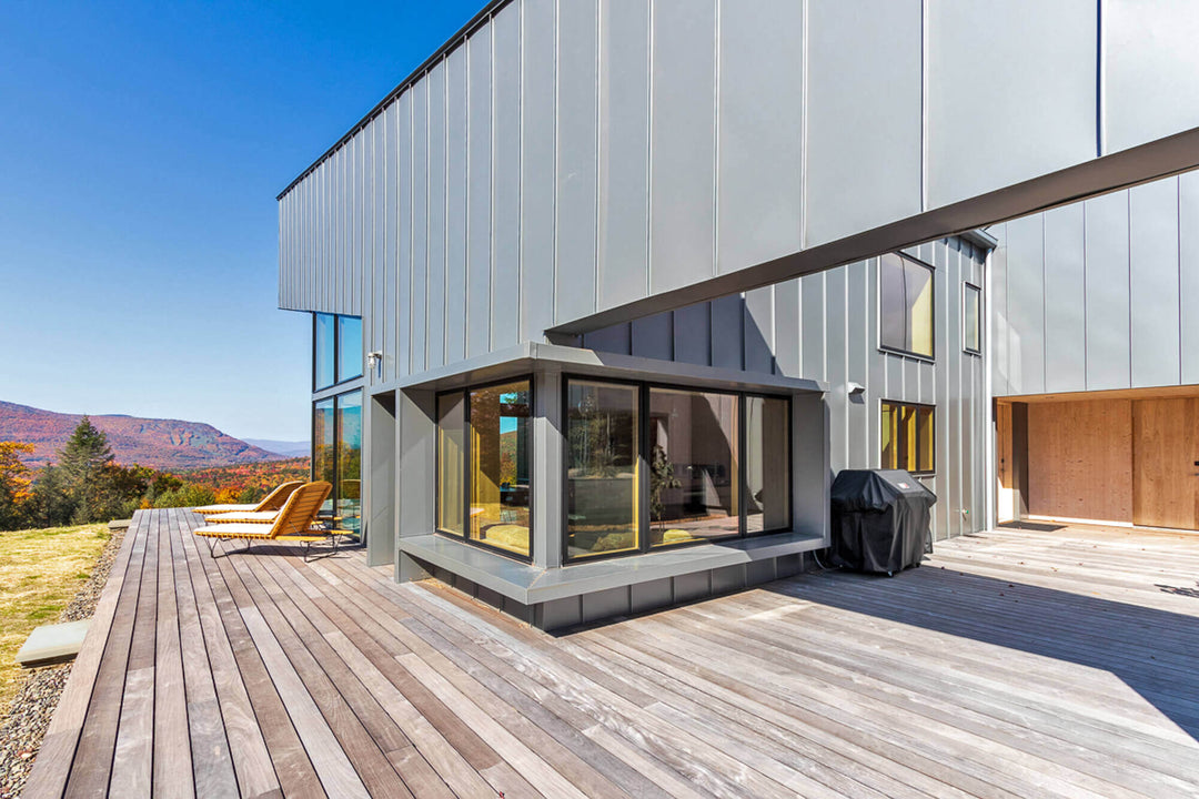 An exterior angle of the Berhaus Hunter contemporary lodge home.