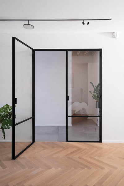 White oak herringbone flooring in a modern and minimalist style home.