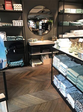 Store features wooden floors finished with Rubio Monocoat Oil Plus 2C.