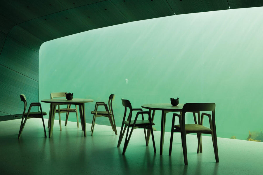 Restaurant tables in a dining room under a lake.