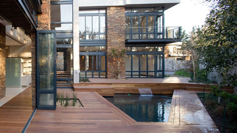 Wooden pool deck finished with Rubio Monocoat.