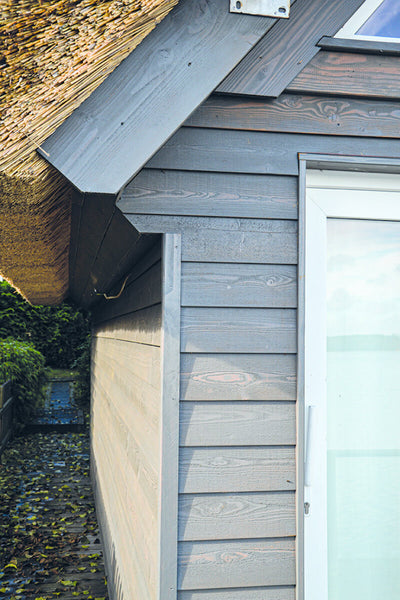 Unique private house, with straw roof, on the lake finished with Rubio Monocoat products.