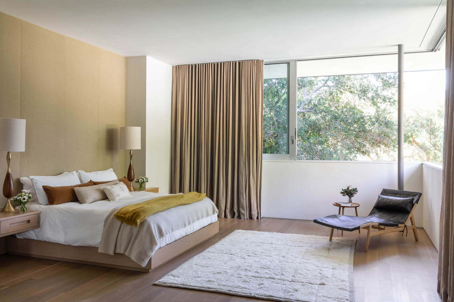 Minimalistic modern bedroom with wood floors finished with Rubio Monocoat Oil Plus 2C hardwax oil wood finish.