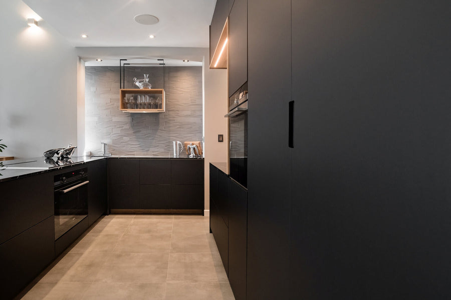 Wood kitchen fixtures with a natural wood finish.