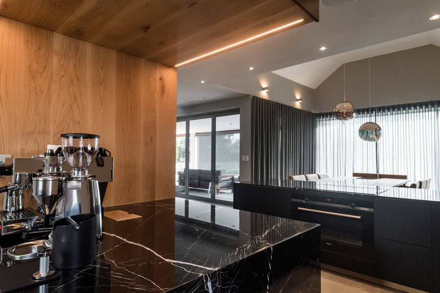 Coffee bar with wood planks that have a natural wood finish on them.
