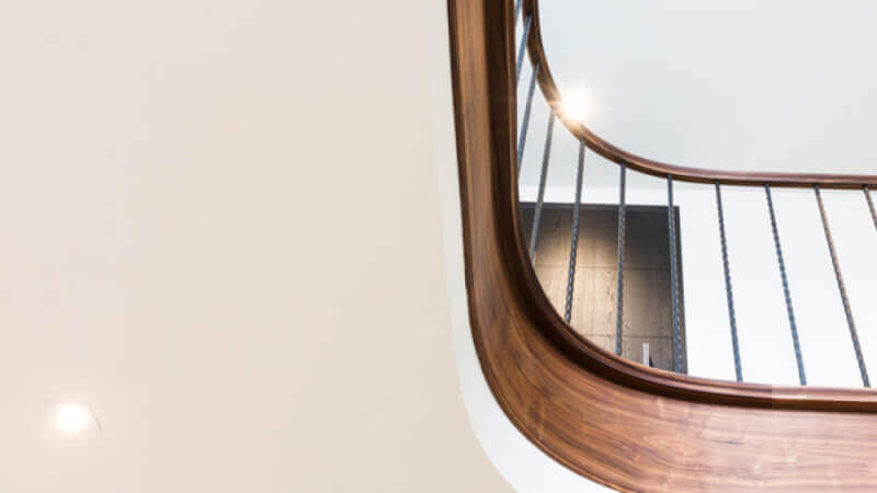 Walnut staircase finished with Rubio Monocoat hardwax oil.