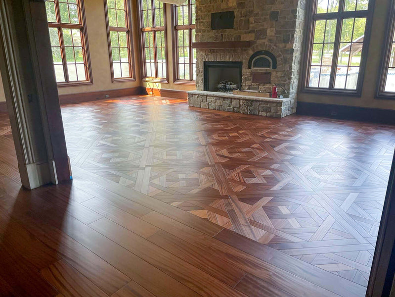 A view into the main living room of the vertical grain eight inch flooring and the Bordeaux parquet flooring.