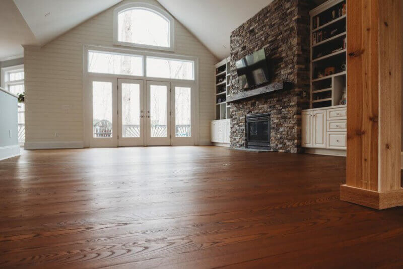 Living room with ash wood flooring finished with Rubio Monocoat products.
