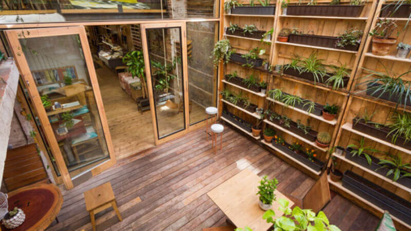 Garden room in Barcelona features wood finished with Rubio Monocoat.