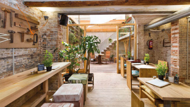 Entryway to restaurant in Barcelona, Spain with wood finished with Rubio Monocoat.
