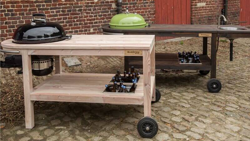 A couple wooden barbecue carts.