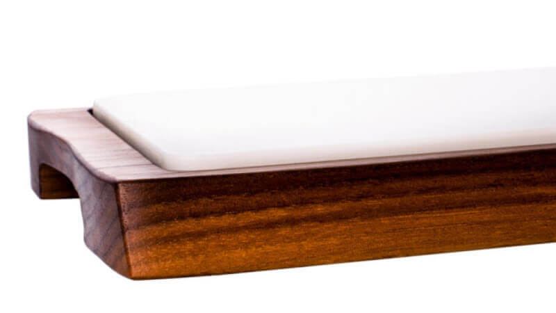 A walnut wood serving tray.