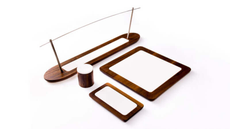 A set of walnut wood serving utensils finished with Oil Plus 2C hardwax oil wood finish.