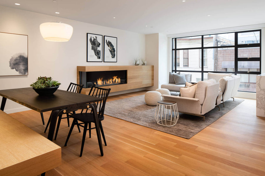 Living room with natural wood oil finish on rift sawn white oak flooring.