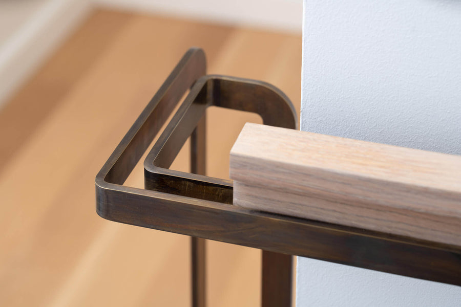 Detailed image of rift sawn white oak handrail for a staircase.