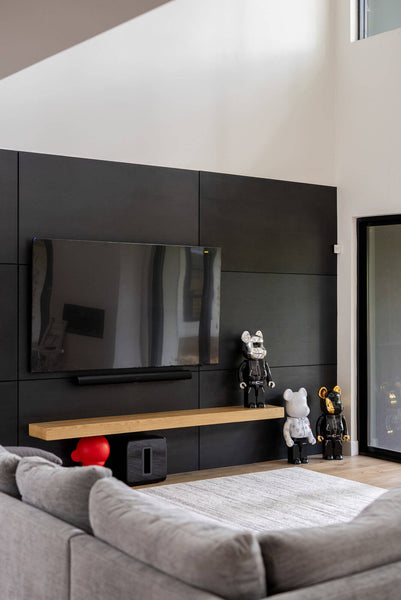 A view of a black stained wood wall finished with Rubio Monocoat products.