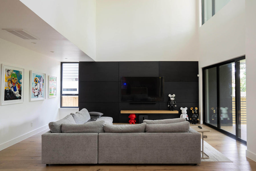 An paned out image of the black accented Chippendale living room.