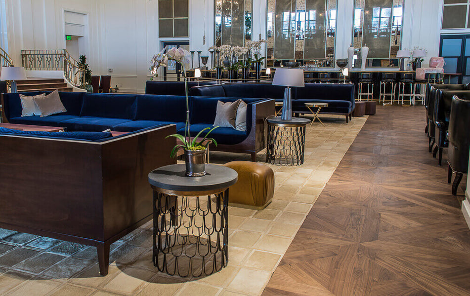 Large lounge with walnut wood flooring finished with hardwax oil wood floor finish.