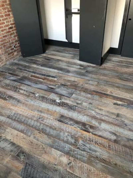 Rustic oak hardwood floors.
