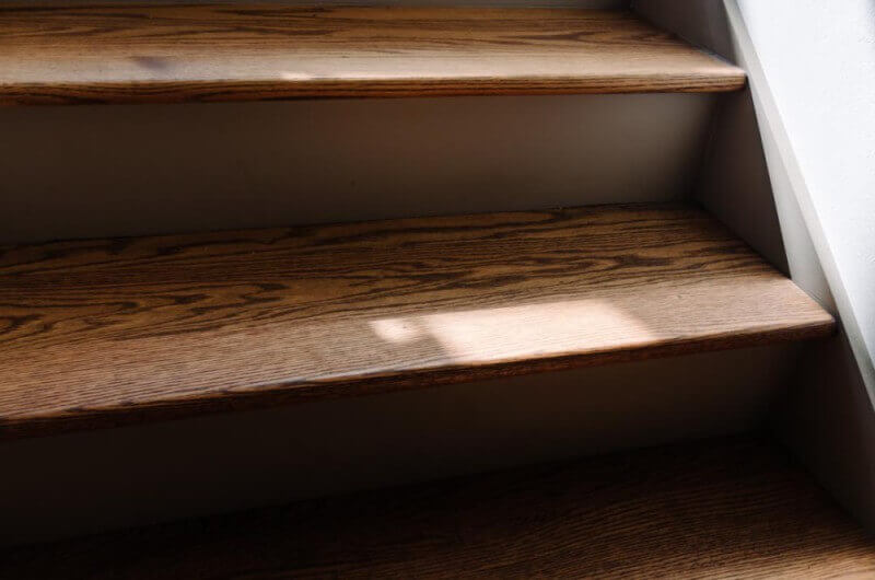 Beautiful grain in red oak stairs brought to life with Rubio Monocoat products.