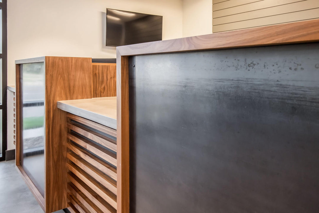 Walnut detail on a reception desk finished with Oil Plus 2C Pure hardwax oil wood stain and finish.