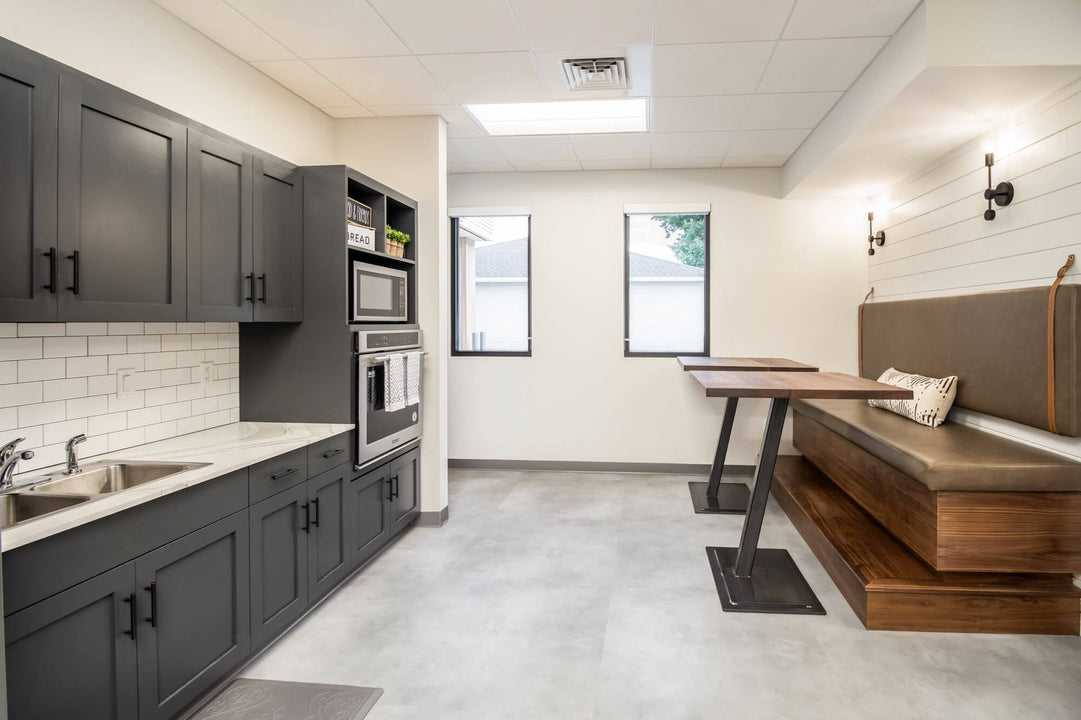 Corporate office breakroom with walnut accents finished with Rubio Monocoat Oil Plus 2C Pure hardwax oil wood stain and finish for interior wood projects.
