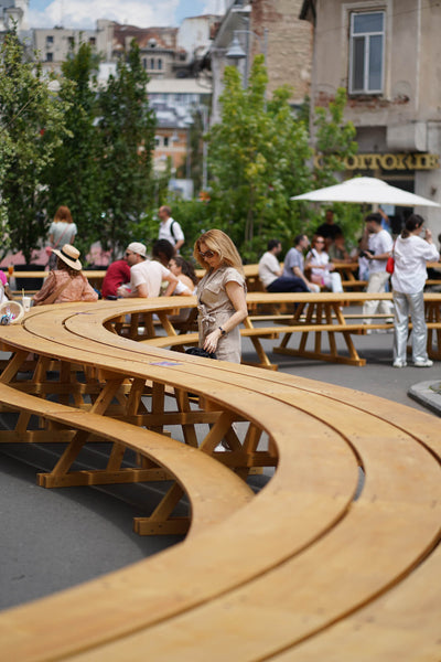 A large winding outdoor table meant for a crowd finished with DuroGrit exterior wood stain and finish in one. 