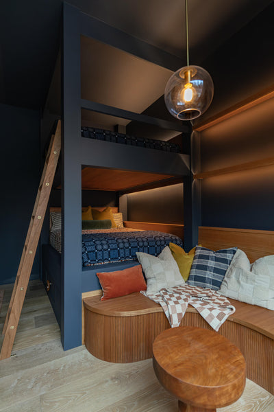 A seating area made from cherry off a set of bunk beds. 