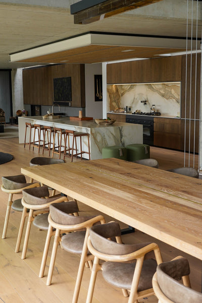 A large oak dining table finished with Oil Plus 2C, a hardwax oil wood stain and finish for all interior wood projects. 