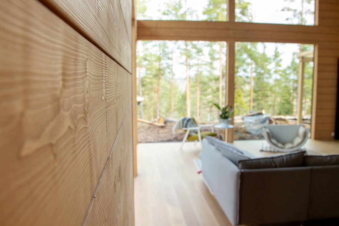 Grain detail of spruce wall paneling finished with Rubio Monocoat Oil Plus 2C hardwax oil wood finish.