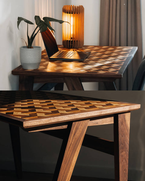 Two photos of a walnut desk with a geometric inlay crafted from a variety of wood species. 