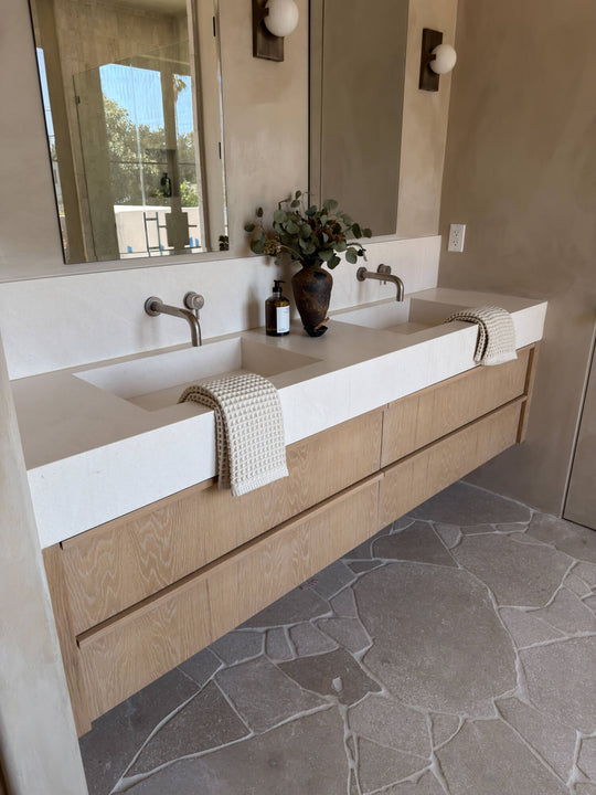 Close view of a floating white oak double vanity finished with Rubio Monocoat Oil Plus 2C Natural.
