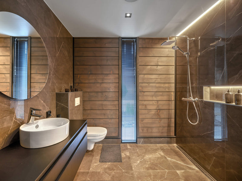 A bathroom with spruce paneling finished with Rubio Monocoat Precolor Easy "Cashmere Brown" and Oil Plus 2C "Oyster".