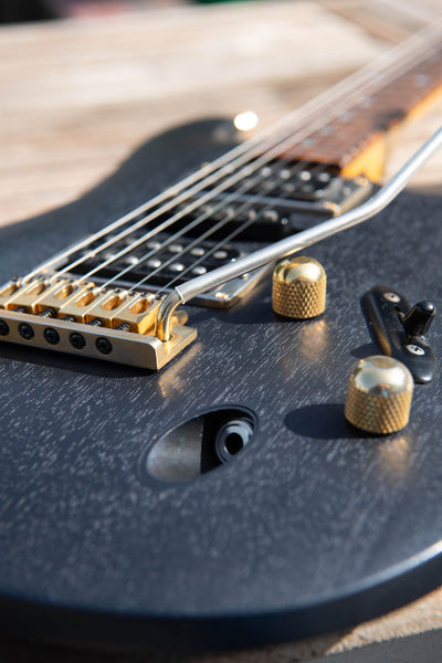Detail shot of a recently refinished Ibanez guitar made from mahogany wood.