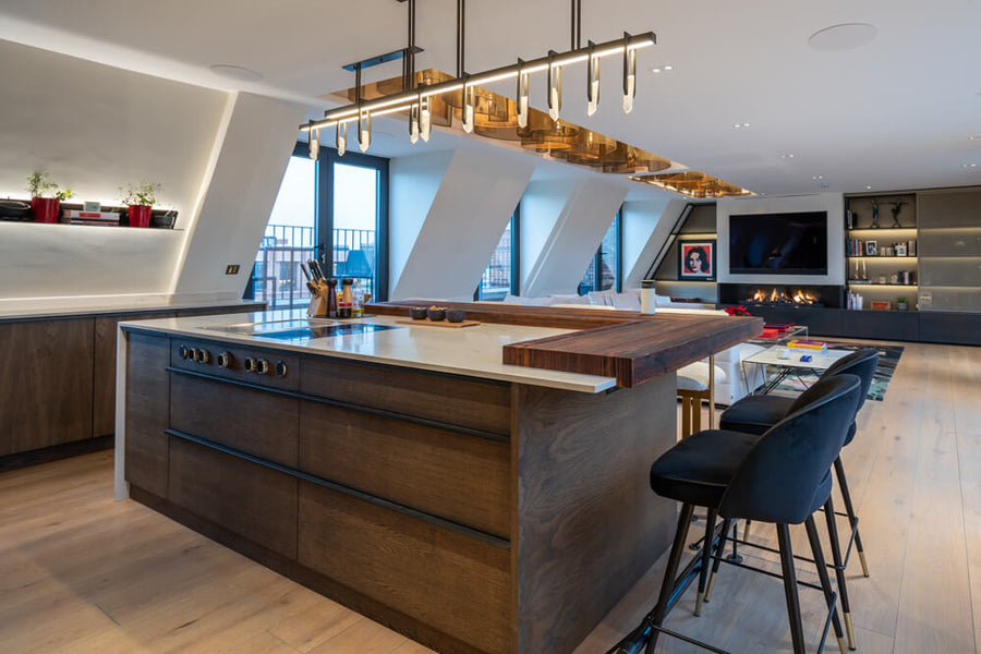 An oak kitchen island finished with Rubio Monocoat Oil Plus 2C Charcoal.