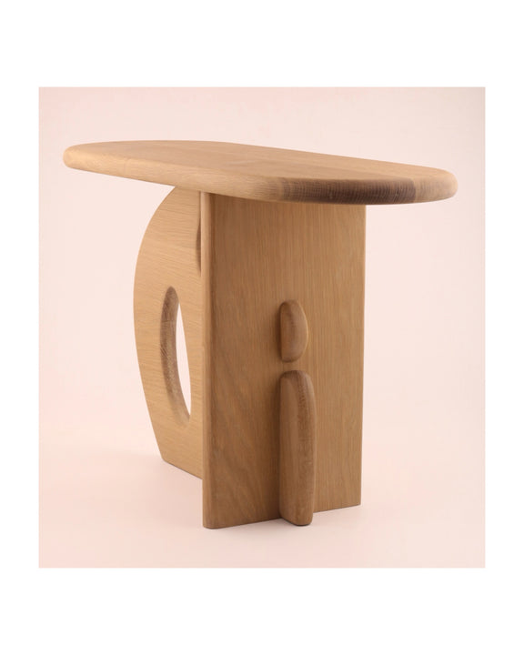 Rounded features of a modern-inspired white oak table finished with a hardwax oil interior wood finish.