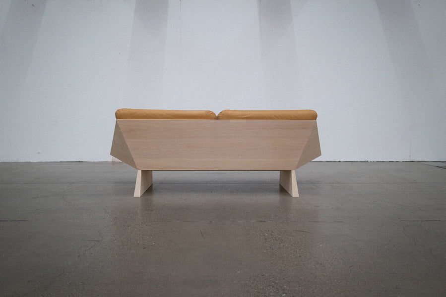 Geometric lines of an ash sofa finished with Oil Plus 2C White 5% hardwax oil wood stain and finish in one.