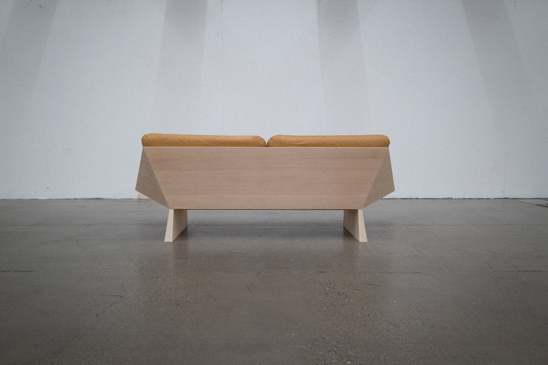 Geometric lines of an ash sofa finished with Oil Plus 2C White 5% hardwax oil wood stain and finish in one.