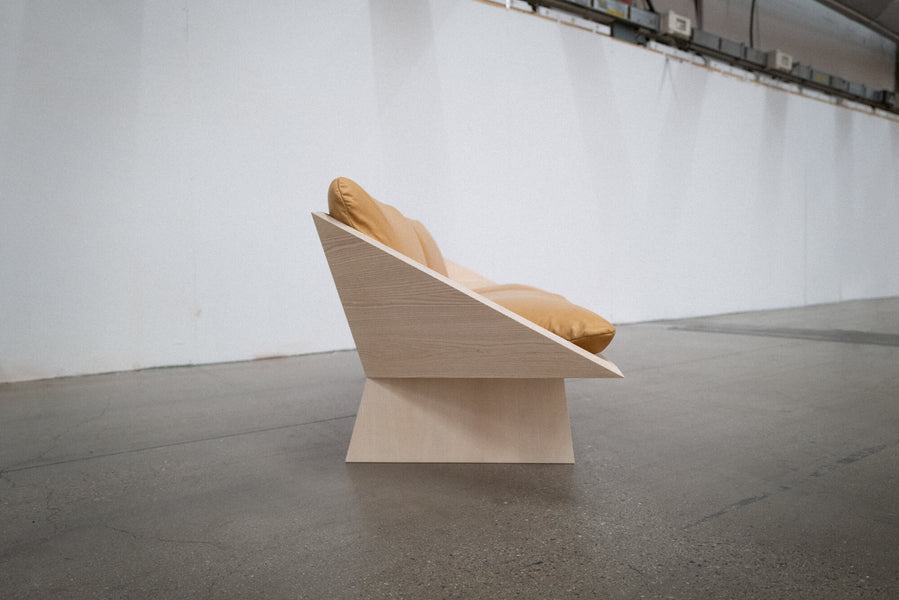 Side of a geometric sofa finished with Rubio Monocoat Oil Plus 2C hardwax oil wood stain and finish in one.