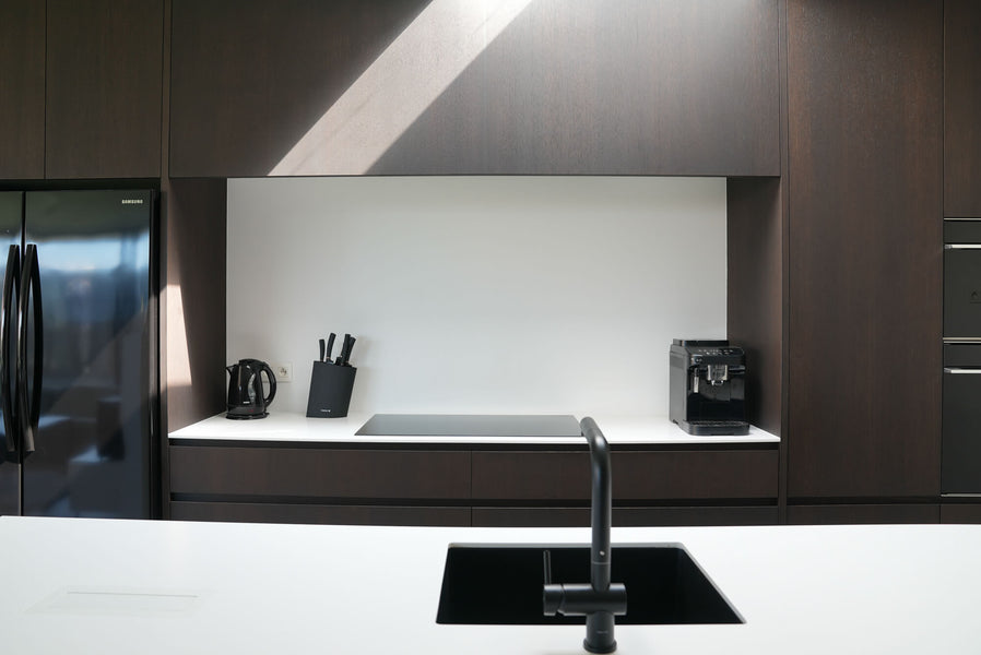Oak cabinetry finished with a combination of Rubio Monocoat wood stain and finish products for an espresso appearance.