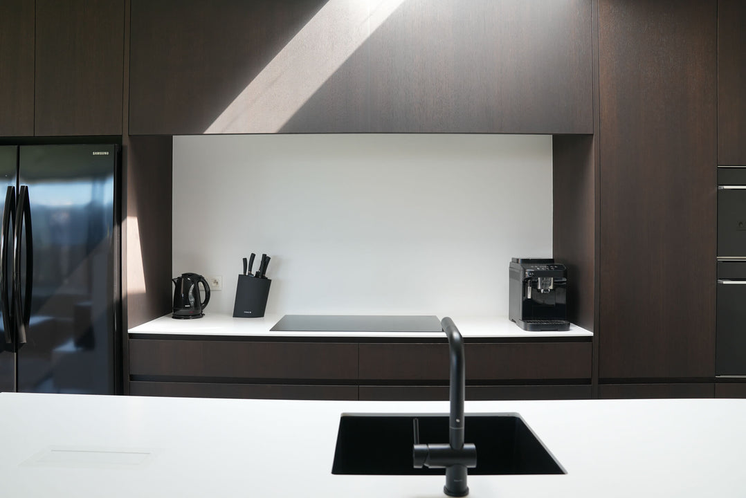 Oak cabinetry finished with a combination of Rubio Monocoat wood stain and finish products for an espresso appearance.