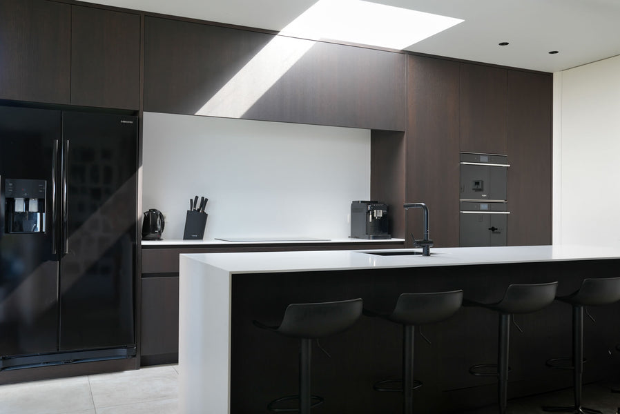 Minimalist kitchen with dark espresso wood cabinetry finished with Precolor Easy Mystic Brown and Oil Plus 2C Black for an espresso like wood finish.