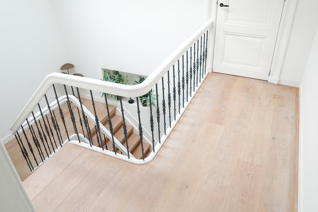 An oak staircase treated with Oil Plus 2C Cotton White