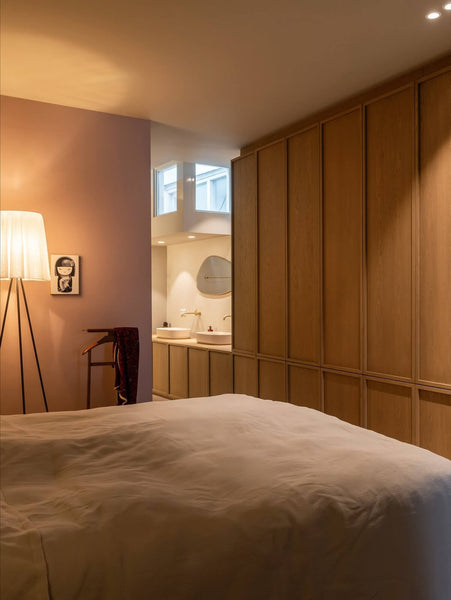 Full European oak cabinetry in a bedroom finished with Rubio Monocoat Oil Plus 2C "Mocha".
